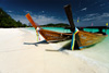 Island Paradise Photo: A white sand beach on a small island off the southern coast of Thailand, typical of the natural beauty all over the country.  These longtail boats are powered by used automobile engines and form a large part of the local transportation around the islands of Thailand.