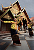 Barefooted Dance Photo: Northern Thai traditional dancers at Wat Phrathat Doi Suthep during what was supposed to be a monk filled celebration for the Thai new year of Songkran.  The monks never materialized, but as you can guess by the dark clouds, torrential rain did.