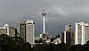 KL Skyline Photo: The Menara Tower pierces the skyline of a modern metropolis.