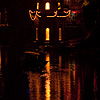 String Lighting Photo: The nighttime reflection of a pagoda in the Li River of Fenghuang.