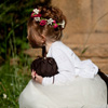Shadow's Edge Photo: A flower girl rests while the wedding party poses for their contrived snapshots.
