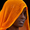 Saree Vendor Photo: A saree seller in the market eyes me suspiciously.