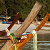Ribbons Photo: Colorful ribbons hang off the bows of longtail boats.