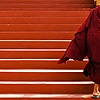 Tardy Trot Photo: A monk is late to the (disputed) 17th Karmapa, His Holiness Ogyen Trinley Dorje's birthday ceremony (archived photos, on the weekends).