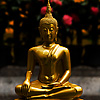 Beaming Buddha Photo: A small meditating golden Buddha statue in lotus position at Doi Suthep temple (ARCHIVED PHOTO on the weekends - originally photographed 2007/05/31).
