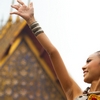 photo: Sonkran Steppin' - A beautiful Thai woman performs a unique dance originating from northern Thailand for Songkran at Wat Pho temple.