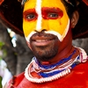 photo: Taipei Tribesman - A Papua New Guinea man displays the traditional tribal clothes of his countrymen.